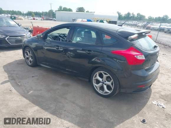 2014 Ford Focus ST with VIN 1FADP3L98EL269058, listed as a IAAI auction lot 42169021 with 106,325 mi miles and . Bid and sale history available at carsss.com. Image 3.
