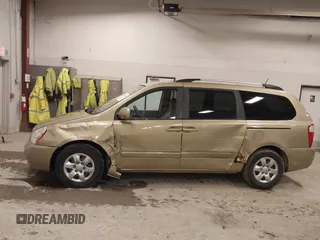 2009 Kia Sedona LX with VIN KNDMB233996314804, listed as a IAAI auction lot 42014187 with 220,693 mi miles and . Bid and sale history available at DreamBid. Image 14.