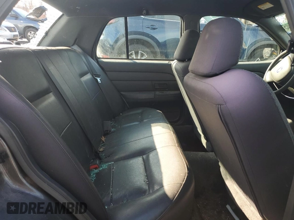 2004 Ford Police Interceptor Base w/3.27 Axle with VIN 2FAFP71W54X126756, listed as a Copart auction lot 50311705 with 135,654 mi miles and Salvage title. Bid and sale history available at DreamBid. Image 10.
