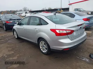 2012 Ford Focus SEL with VIN 1FAHP3H28CL266719, listed as a IAAI auction lot 42008714 with 169,880 mi miles. Bid and sale history available at carsss.com. Image 3.