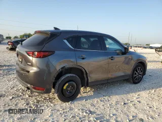 2017 Mazda CX-5 Grand Touring with VIN JM3KFBDL1H0148961, listed as a Copart auction lot 52648115 with 171,767 mi miles and Salvage Title. Bid and sale history available at carsss.com. Image 3.