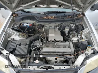 1999 Honda CR-V LX z VIN JHLRD1847XC040936, wystawiony jako Copart lot #56286075 z przebiegiem 296 489 mil mil oraz Szkoda całkowita • Salvage title. Historia ofert i sprzedaży dostępna na DreamBid. Obrazek 12.