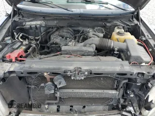 2013 Ford F-150 XL z VIN 1FTEX1EM4DKE77706, wystawiony jako Copart lot #57759535 z przebiegiem 180 754 mil mil oraz Szkoda całkowita • Salvage title. Historia ofert i sprzedaży dostępna na DreamBid. Obrazek 11.