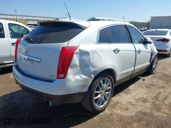 2014 Cadillac SRX Performance Collection with VIN 3GYFNCE38ES675508, listed as a IAAI auction lot 41969292 with 147,534 mi miles and . Bid and sale history available at DreamBid. Image 4.