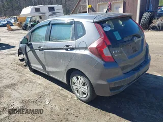 2018 Honda Fit LX z VIN 3HGGK5G44JM716592, wystawiony jako IAAI lot #41878820 z przebiegiem 70 464 mil mil oraz . Historia ofert i sprzedaży dostępna na DreamBid. Obrazek 3.