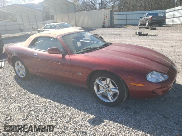 1999 Jaguar XK z VIN SAJGX2043XC032962, wystawiony jako Copart lot #49312155 z przebiegiem 74 662 mil mil oraz Szkoda całkowita • Salvage title. Historia ofert i sprzedaży dostępna na DreamBid. Obrazek 4.