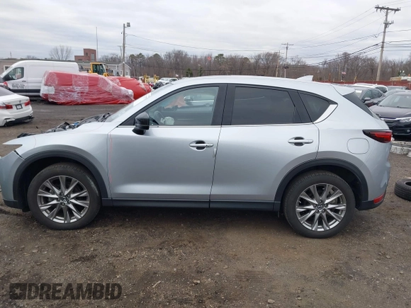 2020 Mazda CX-5 Grand Touring with VIN JM3KFBDM4L0843825, listed as a IAAI auction lot 41733575 with 18,800 mi miles. Bid and sale history available at carsss.com. Image 15.