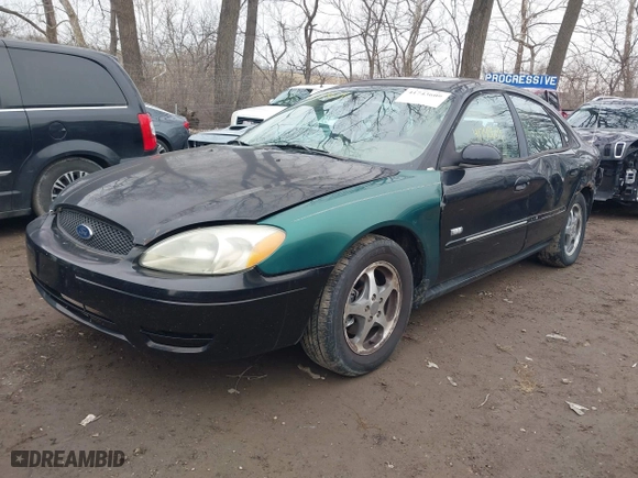 2003 Ford Taurus SEL Deluxe with VIN 1FAHP56S83A243290, listed as a IAAI auction lot 41743609 with 206,399 mi miles. Bid and sale history available at carsss.com. Image 17.