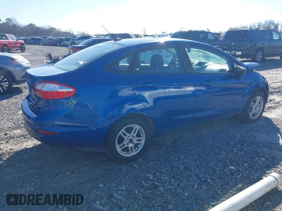 2018 Ford Fiesta SE with VIN 3FADP4BJ4JM135965, listed as a IAAI auction lot 41569841 with 128,347 mi miles. Bid and sale history available at carsss.com. Image 4.