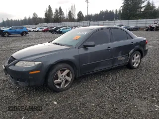 2004 Mazda 6 i with VIN 1YVFP80C045N12892, listed as a Copart auction lot 86513924 with 230,683 mi miles and Salvage Title. Bid and sale history available at DreamBid. Image 1.
