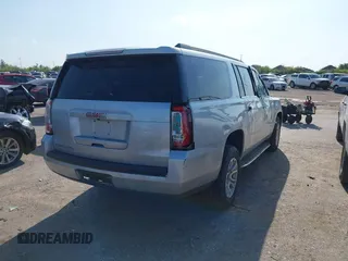 2016 GMC Yukon XL SLT z VIN 1GKS1GKC3GR268945, wystawiony jako IAAI lot #41864816 z przebiegiem 171 815 mil mil oraz . Historia ofert i sprzedaży dostępna na DreamBid. Obrazek 4.