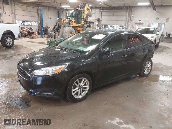 2015 Ford Focus SE with VIN 1FADP3F24FL285287, listed as a IAAI auction lot 41937687 with 130,460 mi miles. Bid and sale history available at carsss.com. Image 2.
