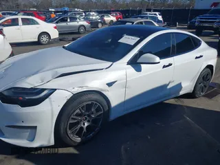 2021 Tesla Model S Long Range with VIN 5YJSA1E56MF453711, listed as a IAAI auction lot 41467603 with 115,634 mi miles and . Bid and sale history available at DreamBid. Image 6.