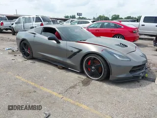 2014 Chevrolet Corvette Z51 3LT z VIN 1G1YL2D78E5128387, wystawiony jako IAAI lot #42372075 z przebiegiem 136 632 mil mil oraz . Historia ofert i sprzedaży dostępna na DreamBid. Obrazek 1.