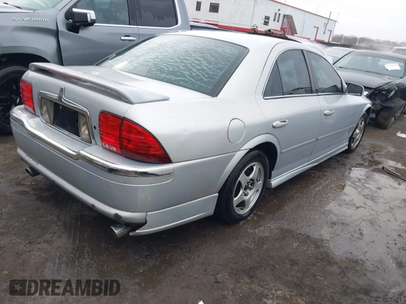2002 Lincoln LS w/Base Pkg with VIN 1LNHM87A12Y607979, listed as a IAAI auction lot 41523445 with 174,826 mi miles. Bid and sale history available at carsss.com. Image 4.