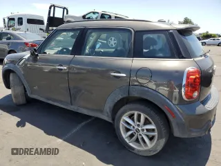 2012 MINI Countryman S with VIN WMWZC5C54CWL60924, listed as a Copart auction lot 56950315 with Not Provided miles and Clean Title. Bid and sale history available at DreamBid. Image 2.