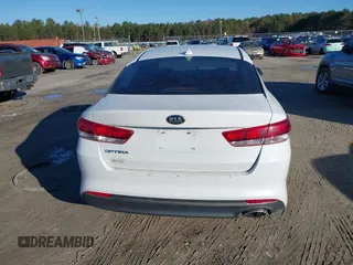 2016 Kia Optima LX with VIN 5XXGT4L36GG005859, listed as a IAAI auction lot 41053277 with 127,783 mi miles. Bid and sale history available at carsss.com. Image 16.