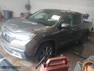 2020 Honda Ridgeline RTL-E with VIN 5FPYK3F75LB001516, listed as a IAAI auction lot 41605859 with 93,902 mi miles. Bid and sale history available at carsss.com. Image 2.
