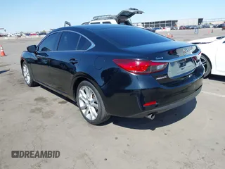 2017 Mazda Mazda6 Touring with VIN JM1GL1V55H1155696, listed as a IAAI auction lot 42003172 with 95,300 mi miles. Bid and sale history available at carsss.com. Image 3.