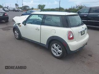 2012 MINI Hardtop with VIN WMWSU3C54CT262450, listed as a IAAI auction lot 42148430 with 55,250 mi miles and . Bid and sale history available at DreamBid. Image 3.