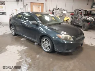 2007 Scion tC Spec with VIN JTKDE177870164952, listed as a IAAI auction lot 41589012 with 143,994 mi miles. Bid and sale history available at carsss.com. Image 1.