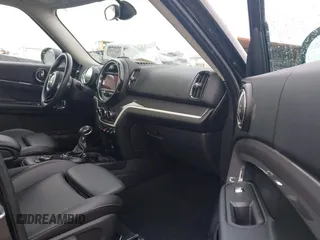 2017 MINI Countryman Cooper S with VIN WMZYT3C34H3D98585, listed as a IAAI auction lot 41752740 with 58,381 mi miles. Bid and sale history available at carsss.com. Image 5.