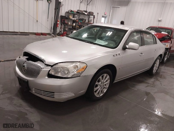 2009 Buick Lucerne CX-2 with VIN 1G4HP57M69U145405, listed as a IAAI auction lot 41548976 with 114,977 mi miles. Bid and sale history available at carsss.com. Image 2.