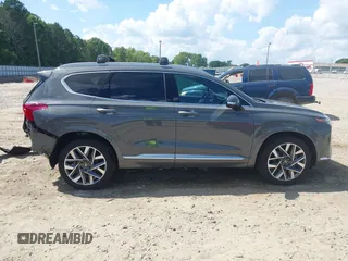 2023 Hyundai Santa Fe Calligraphy with VIN 5NMS54ALXPH633514, listed as a IAAI auction lot 42238114 with 12,969 mi miles and . Bid and sale history available at DreamBid. Image 13.