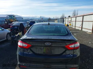 2014 Ford Fusion SE Hybrid with VIN 3FA6P0LU8ER178191, listed as a IAAI auction lot 41703425 with 157,162 mi miles. Bid and sale history available at carsss.com. Image 16.