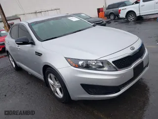 2011 Kia Optima LX with VIN KNAGM4A7XB5169810, listed as a IAAI auction lot 40855136 with 147,541 mi miles. Bid and sale history available at carsss.com. Image 1.