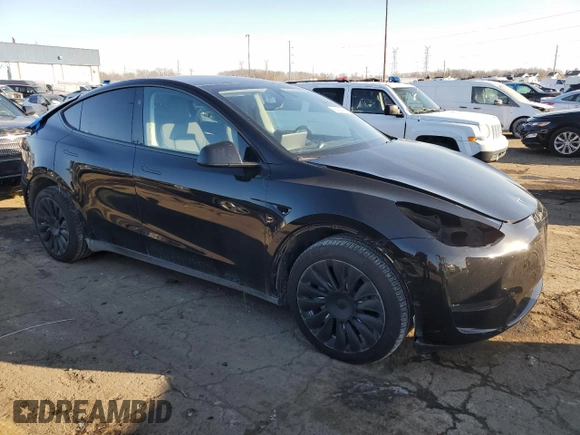 2024 Tesla Model Y Long Range with VIN 7SAYGDEE5RA270382, listed as a Copart auction lot 82899494 with 6,401 mi miles and Clean title. Bid and sale history available at DreamBid. Image 4.