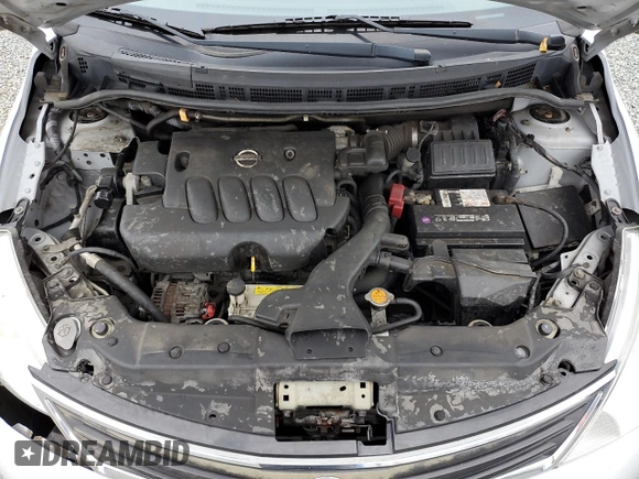 2011 Nissan Versa S with VIN 3N1BC1AP9BL458761, listed as a Copart auction lot 57317115 with 122,606 mi miles and Salvage title. Bid and sale history available at DreamBid. Image 11.
