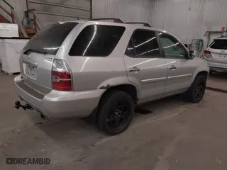 2006 Acura MDX Touring w/Navi with VIN 2HNYD18856H545679, listed as a IAAI auction lot 42026404 with 164,698 mi miles. Bid and sale history available at carsss.com. Image 4.
