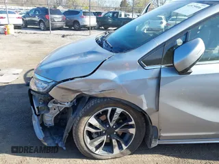 2018 Honda Odyssey Elite z VIN 5FNRL6H91JB070355, wystawiony jako IAAI lot #41975916 z przebiegiem 147 022 mil mil oraz . Historia ofert i sprzedaży dostępna na DreamBid. Obrazek 6.