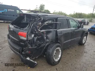 2018 Jeep Grand Cherokee Laredo E with VIN 1C4RJFAG5JC113283, listed as a Copart auction lot 57569595 with 90,897 mi miles and Salvage title. Bid and sale history available at DreamBid. Image 3.