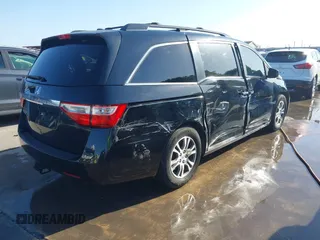 2013 Honda Odyssey EX-L with VIN 5FNRL5H6XDB090768, listed as a IAAI auction lot 42008759 with 116,052 mi miles and . Bid and sale history available at carsss.com. Image 4.