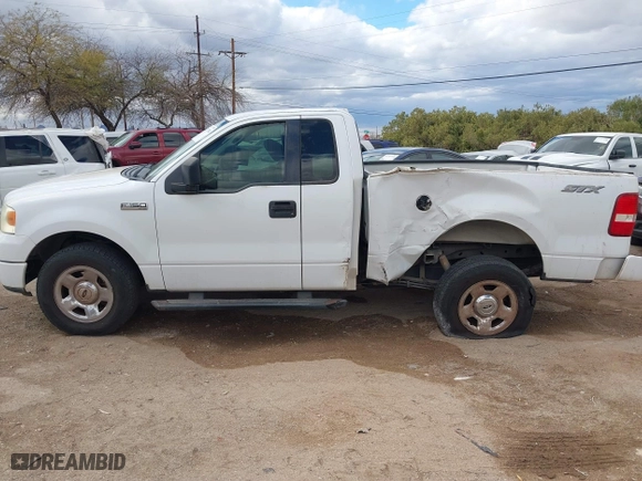 2005 Ford F-150 XL with VIN 1FTRF12W05NB36068, listed as a IAAI auction lot 41732744 with 203,261 mi miles. Bid and sale history available at carsss.com. Image 14.