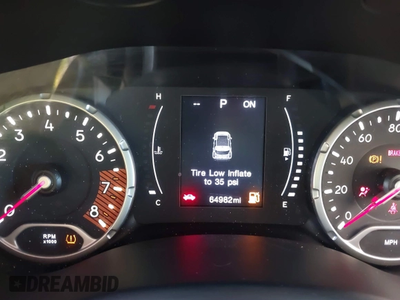 2020 Jeep Renegade Latitude with VIN ZACNJABB8LPL25157, listed as a IAAI auction lot 41065402 with 64,982 mi miles. Bid and sale history available at carsss.com. Image 7.