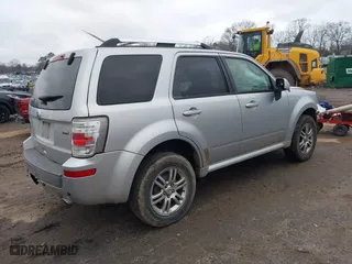 2010 Mercury Mariner Premier with VIN 4M2CN8HG4AKJ02111, listed as a IAAI auction lot 41423963 with 246,600 mi miles. Bid and sale history available at carsss.com. Image 4.