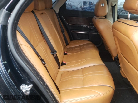 2016 Jaguar XJ R-Sport with VIN SAJWJ1CD3G8V98397, listed as a Copart auction lot 82135843 with 111,657 mi miles and . Bid and sale history available at DreamBid. Image 10.