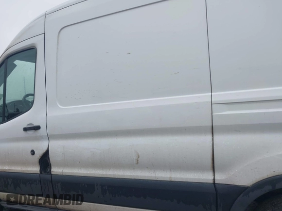 2018 Ford Transit with VIN 1FTYE1CM1JKA35810, listed as a IAAI auction lot 42178750 with 254,654 mi miles and . Bid and sale history available at DreamBid. Image 14.