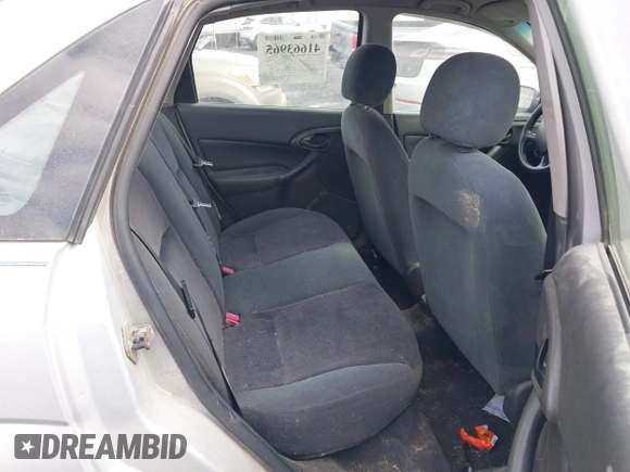 2001 Ford Focus LX with VIN 1FAFP33P31W297608, listed as a IAAI auction lot 41663965 with 142,898 mi miles and . Bid and sale history available at carsss.com. Image 8.