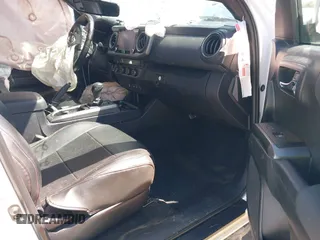 2022 Toyota Tacoma SR z VIN 3TMCZ5AN0NM499428, wystawiony jako IAAI lot #41874787 z przebiegiem Nie podano mil oraz . Historia ofert i sprzedaży dostępna na DreamBid. Obrazek 5.