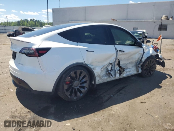 2022 Tesla Model Y Performance with VIN 7SAYGDEF9NF372337, listed as a Copart auction lot 55889345 with 51,099 mi miles and Salvage title. Bid and sale history available at DreamBid. Image 3.