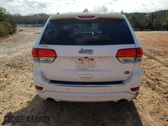 2015 Jeep Grand Cherokee High Altitude with VIN 1C4RJECG4FC654789, listed as a Copart auction lot 49378875 with 163,192 mi miles and Salvage Title. Bid and sale history available at carsss.com. Image 6.