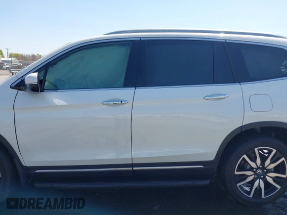 2019 Honda Pilot Touring 8-Passenger z VIN 5FNYF5H93KB021978, wystawiony jako IAAI lot #41915333 z przebiegiem 82 676 mil mil oraz . Historia ofert i sprzedaży dostępna na DreamBid. Obrazek 14.