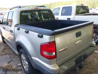 2007 Ford Explorer Sport Trac XLT with VIN 1FMEU51K47UA09905, listed as a IAAI auction lot 42063335 with 156,987 mi miles. Bid and sale history available at carsss.com. Image 3.