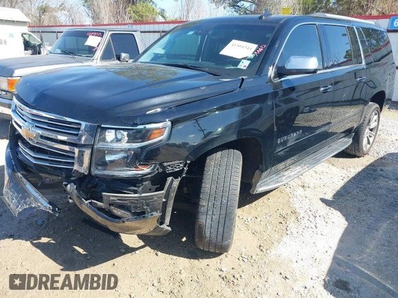 2019 Chevrolet Suburban LT with VIN 1GNSCJKC5KR360318, listed as a IAAI auction lot 41504344 with 82,997 mi miles and . Bid and sale history available at DreamBid. Image 2.