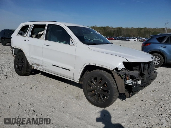 2018 Jeep Grand Cherokee Altitude with VIN 1C4RJEAG1JC110326, listed as a Copart auction lot 50518075 with 126,498 mi miles and Salvage Title. Bid and sale history available at carsss.com. Image 4.