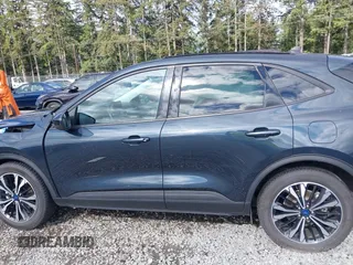 2022 Ford Escape SE Hybrid z VIN 1FMCU9BZ5NUA06681, wystawiony jako IAAI lot #42302156 z przebiegiem 61 582 mil mil oraz . Historia ofert i sprzedaży dostępna na DreamBid. Obrazek 15.